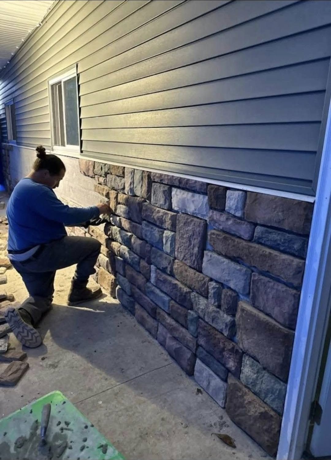 Installing stone veneer on a home exterior